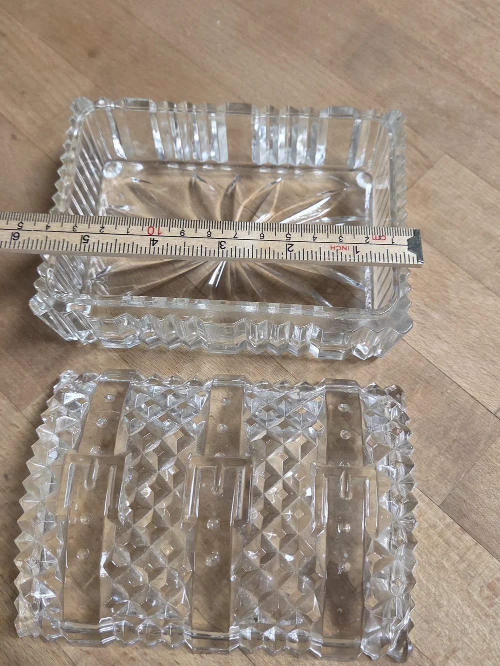 Vintage clear pressed glass trinket box shaped like a miniature treasure chest